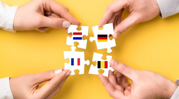 Puzzelstukjes met vlaggen België, Duitsland, Frankrijk en Nederland